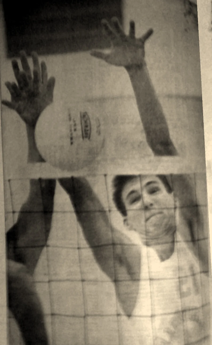 Mike Millett blocking a ball at the net for Chatsworth High, in a 1988 newspaper photo